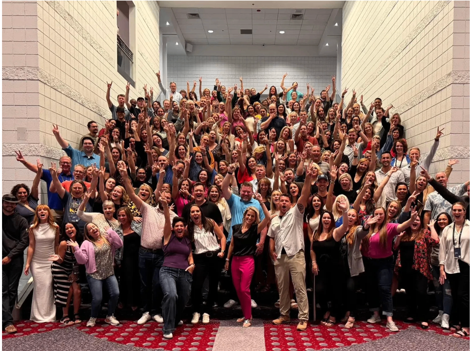 Vega Life Agency team celebrating at a conference